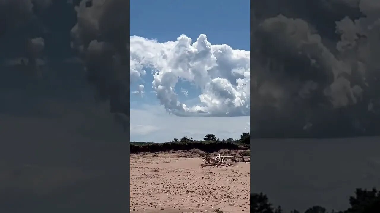 The beach and big clouds
