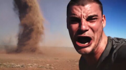 Crazy Guy Runs into Tornado to Take Selfie