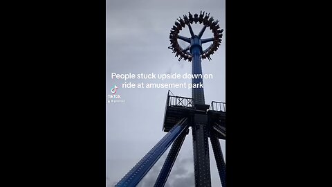 People stuck upside down on ride at amusement park