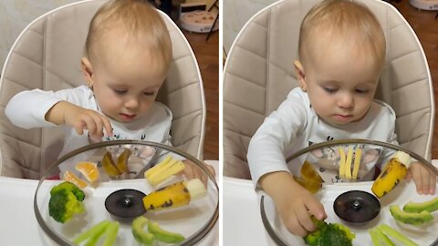 Unique toddler incredibly chooses broccoli over banana