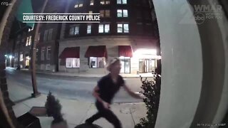 Woman seen on video destroying property in front of Frederick County building