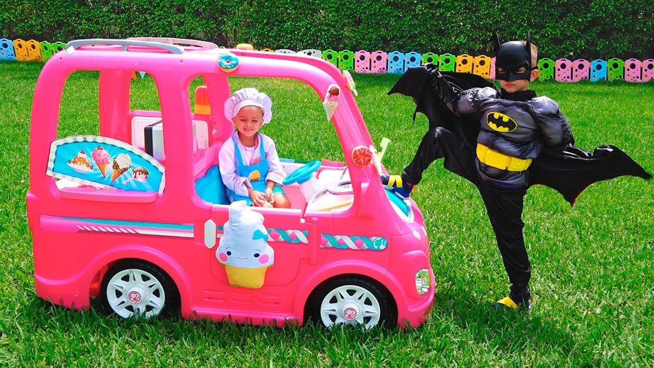 Nikita in a pink car meets superheroes