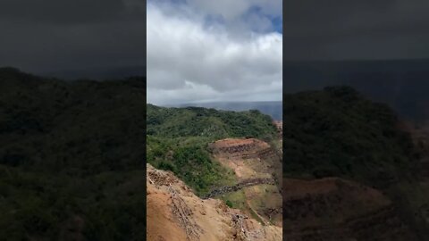 Spotlight on the canyon rocks at Waimea canyon state park, Kauai Hawaii.