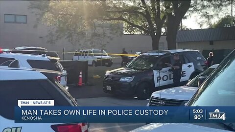 Suspect dies from self-inflicted gunshot wound in back of squad car