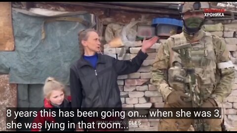 Russian soldier delivers a rabbit to an 8 year-old farm girl who has never seen peace in Donbass