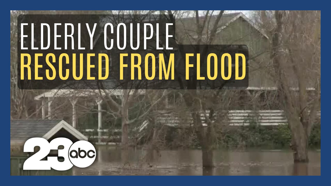 Elderly couple rescued from flooded home