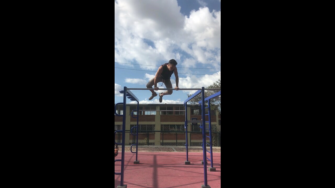 How to do a muscle up to 180 spin over the bar