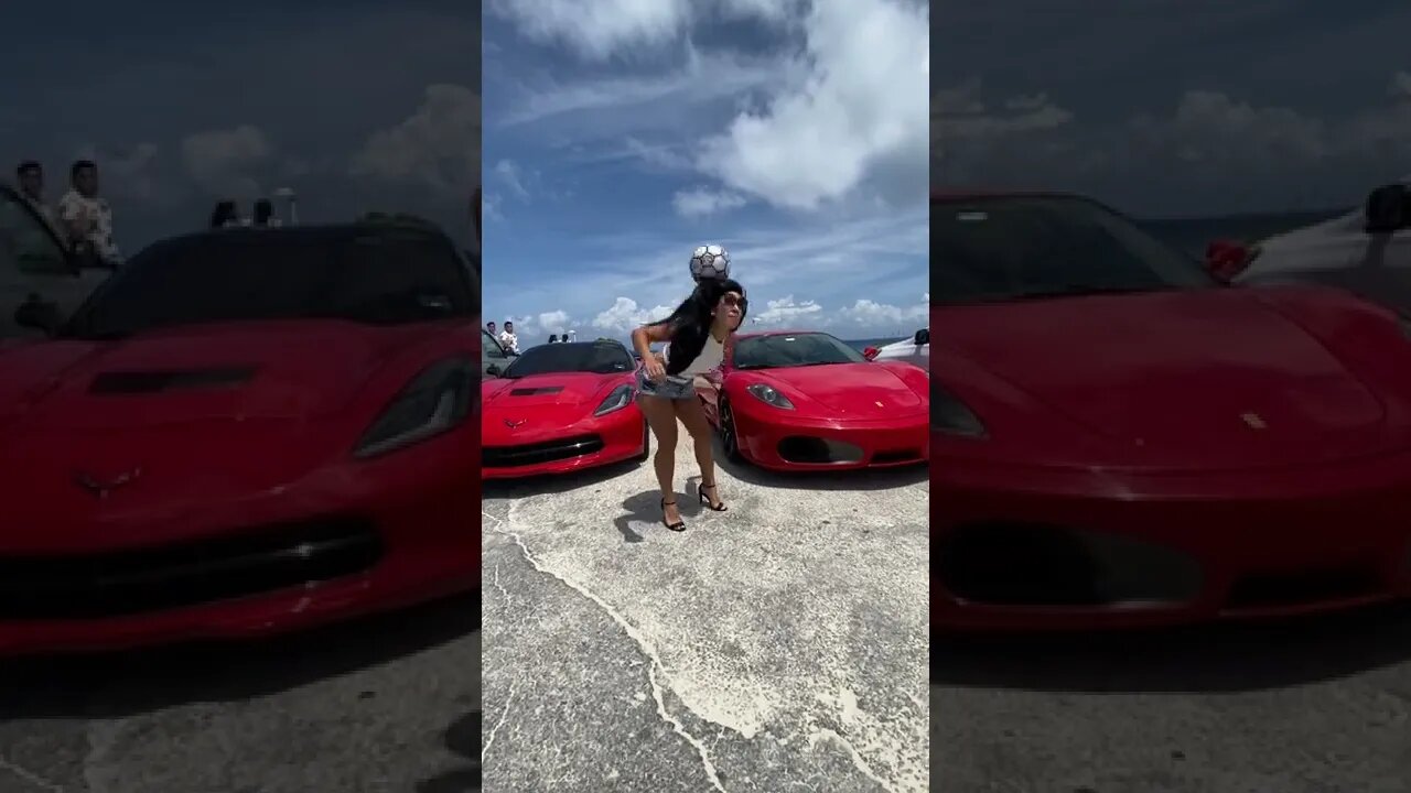 Cute girl doing tricks and nice cars. What else do you want?