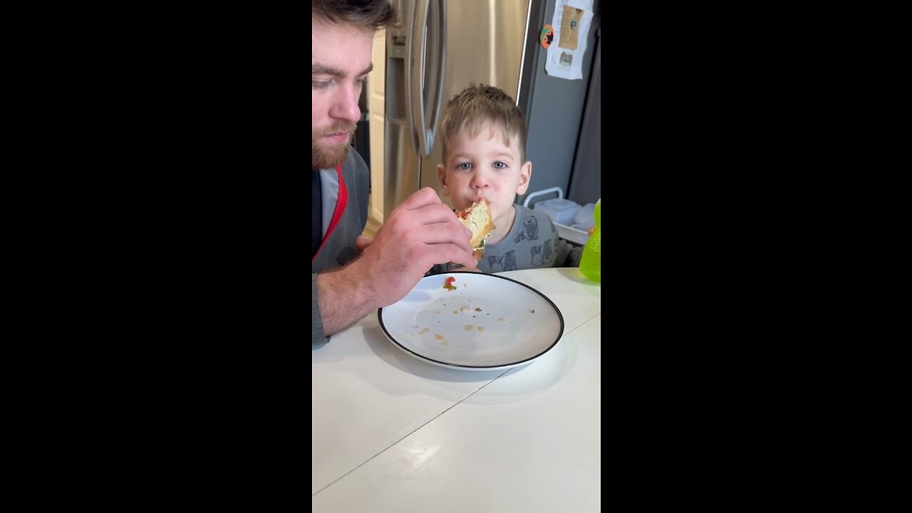 Tasting Italian sliders with my son