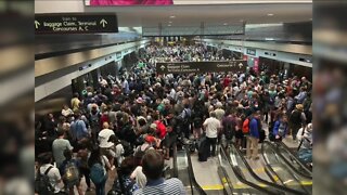 Trains to gates at Denver airport 'temporarily stopped' Tuesday morning