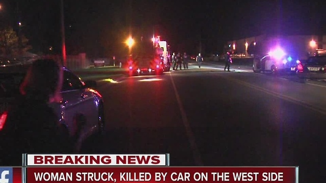 woman struck, killed by car on city's west side