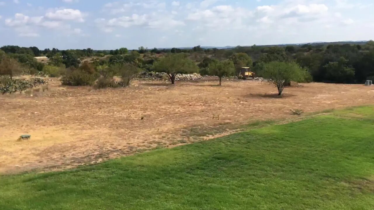 Komatsu D5 Clearing Rock Pile