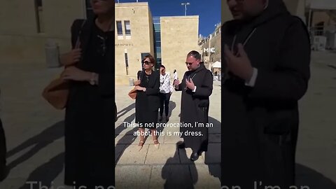 A Christian Priest Is Asked To Remove His Cross In Jerusalem