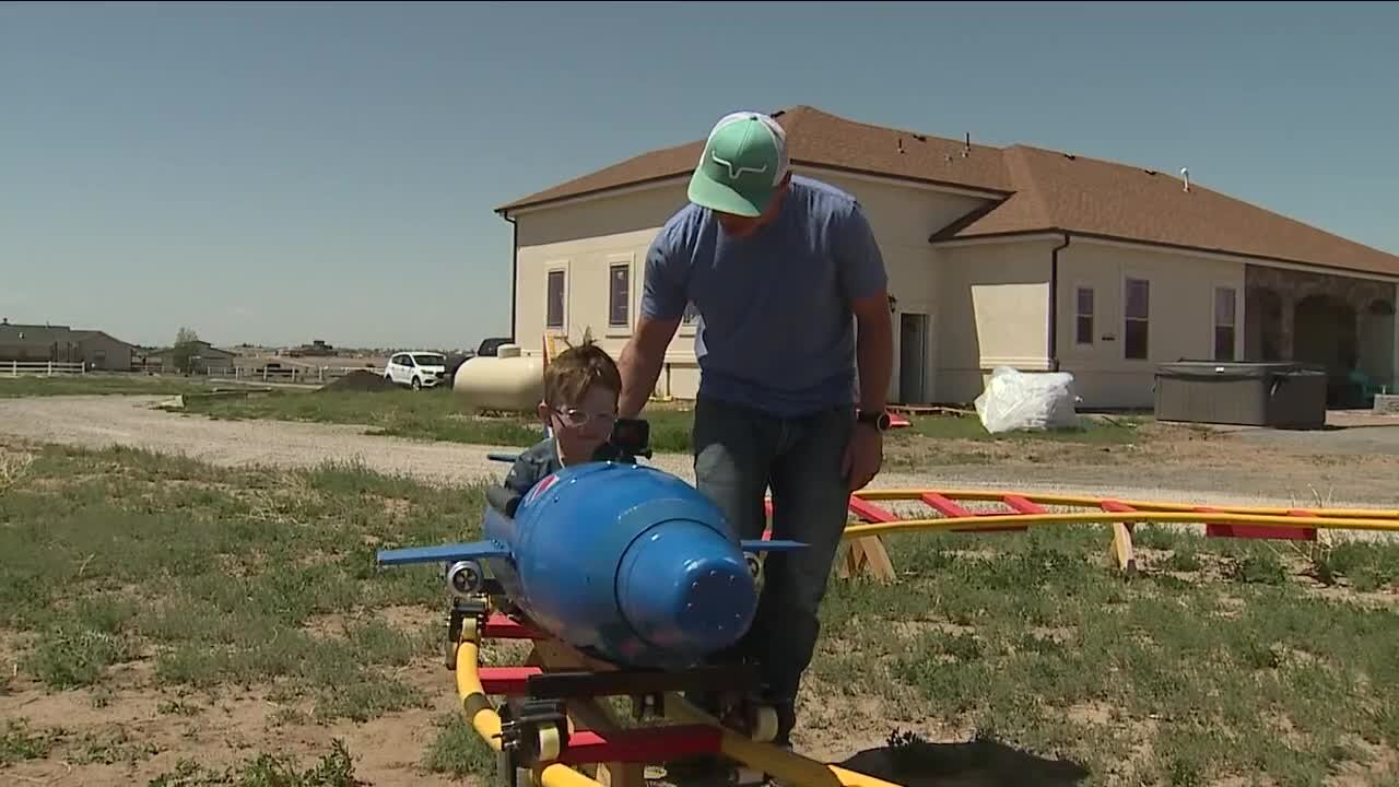 Navy pilot builds roller coaster for 3-year-old son in backyard