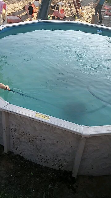 the pool is getting cleaned