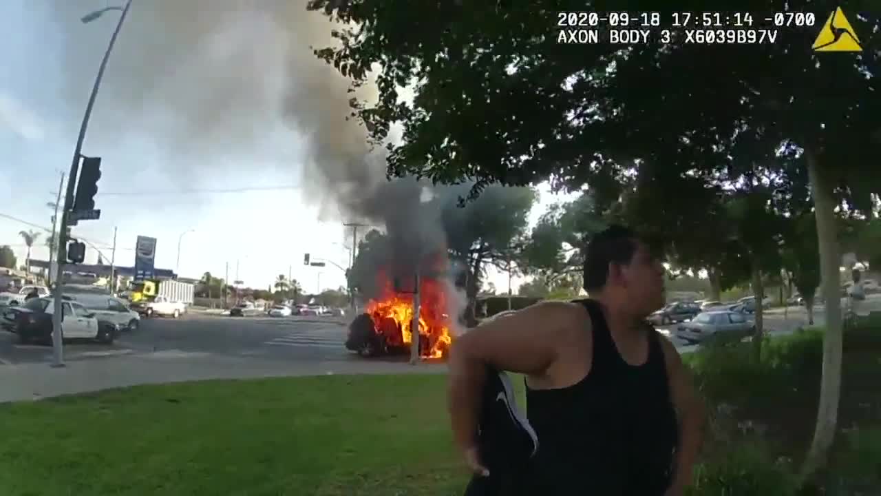 Police officer rescues wheelchair-bound man moments before vehicle ignites