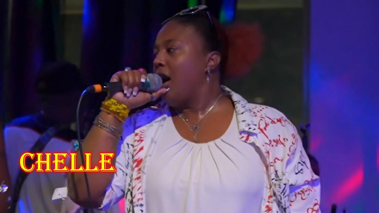 Chelle doing her thing with the Positive Vybz Band.