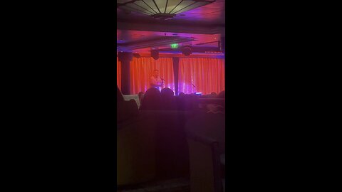 Blu performing karaoke