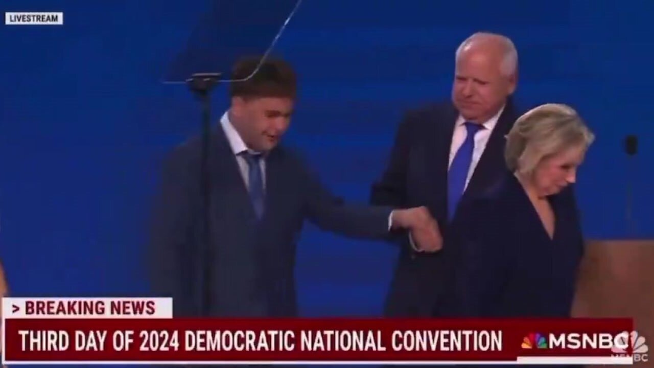 America's Dad?! ANGRY Look On Tim Walz's Face As He YANKS His Son's Arm On DNC Stage Says SO Much