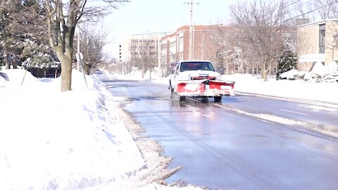 Winter storm exits mid-Michigan, cancels COVID-19 vaccination