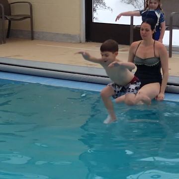 Brother Jumps Into Pool But His Little Sister Tumbles In