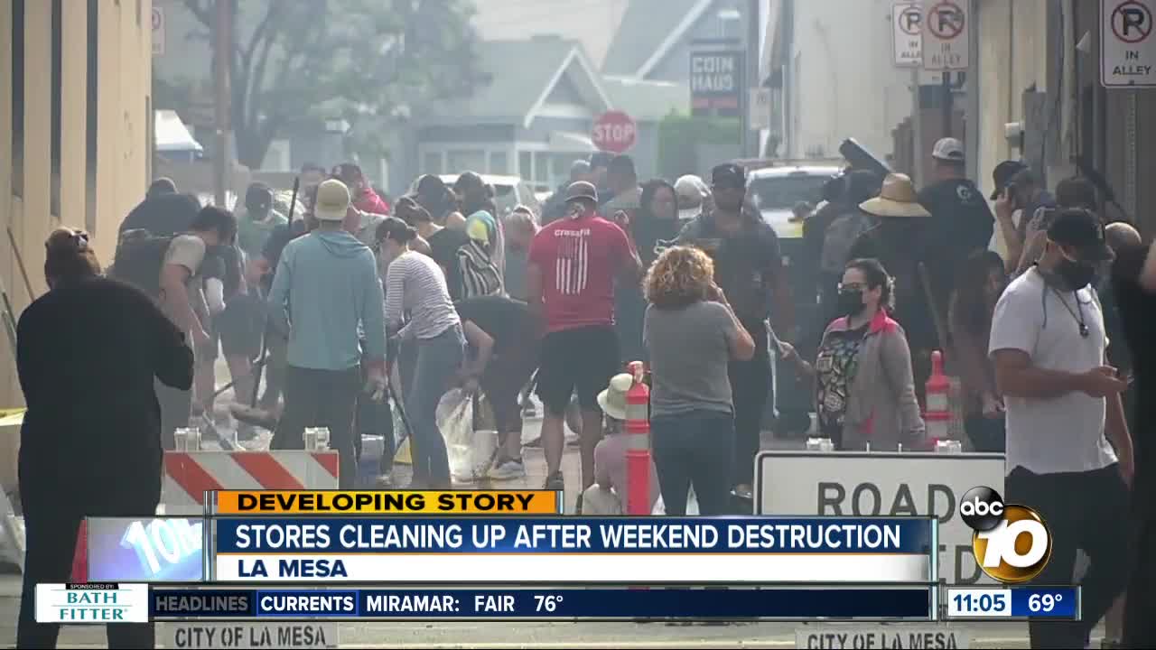 Stores cleaning up after weekend destruction