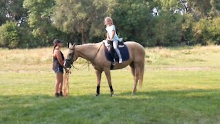 Ally turns a 360° in the saddle