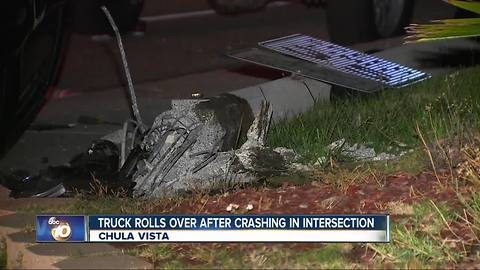 Truck rolls over after crashing at intersection in Chula Vista