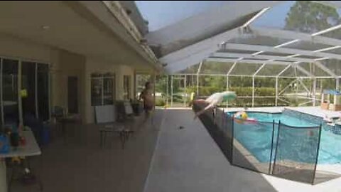 Dad pulls off incredible dive to save son