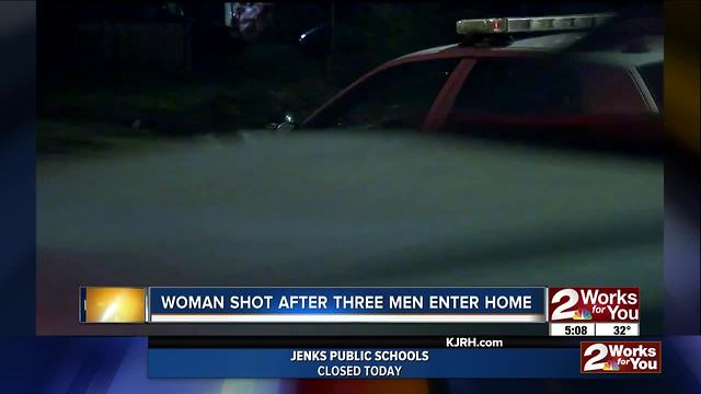 Woman shot after three men enter home