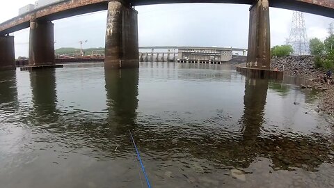 Fishing with a Rooster tail below the Dam