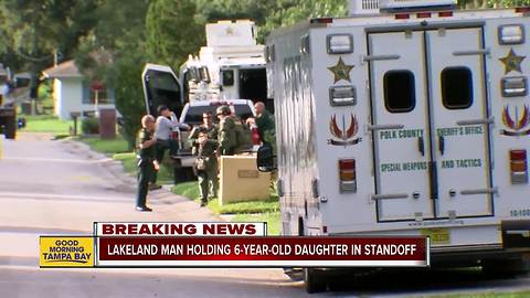 Polk deputies remain on hostage standoff scene