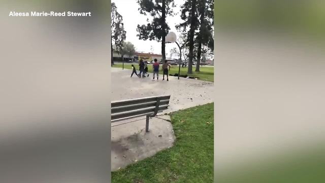 Bakersfield police officer shoots hoops with kids at local park