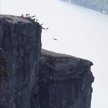 At First I Thought They Were Penguins!! AMAZING Base Jumping