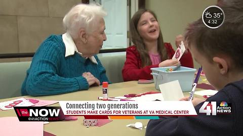 Students and seniors make Valentines for vets