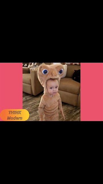 Adorable toddler in E.T. Halloween costume cracks up whole family