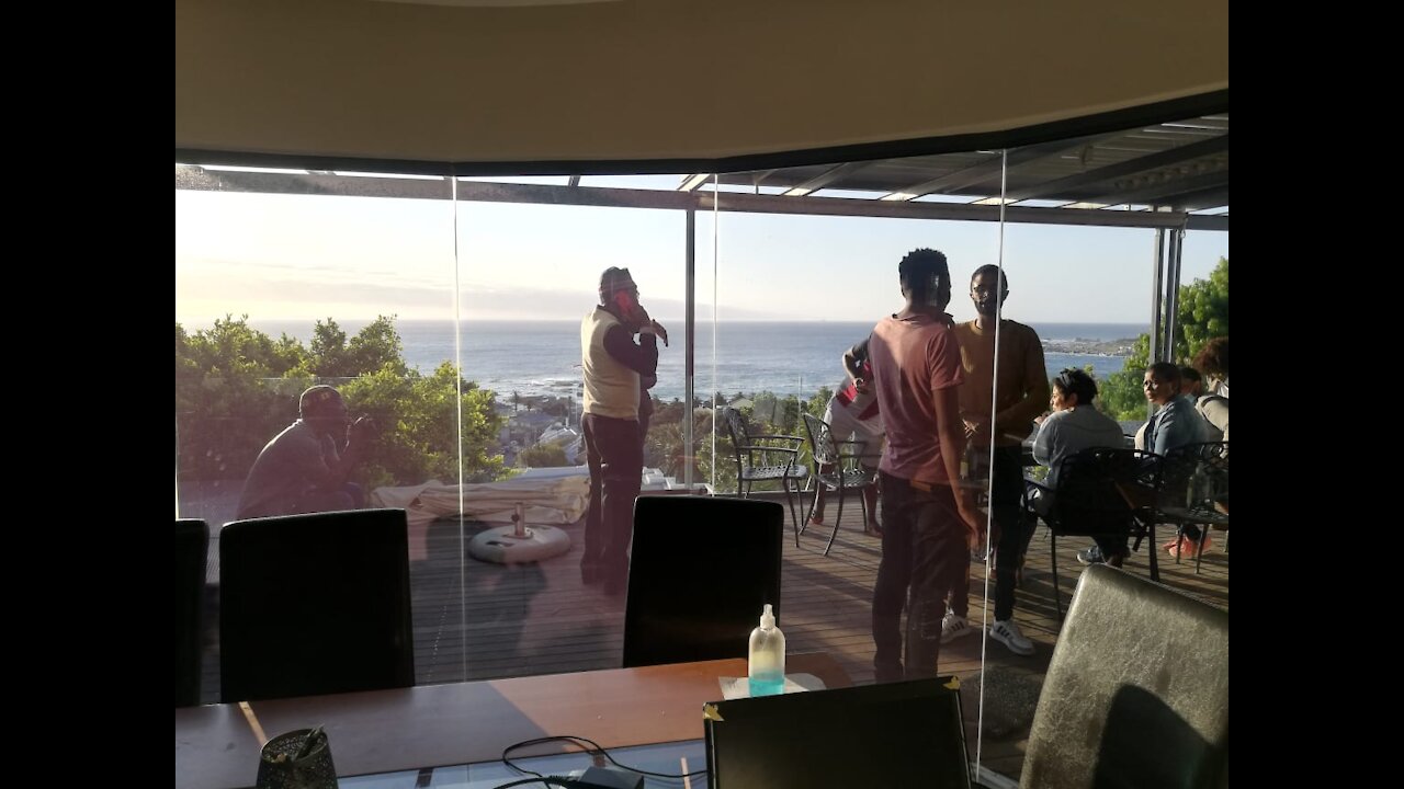 Seven activists occupying a mansion in Camps Bay have until midday of Thursday