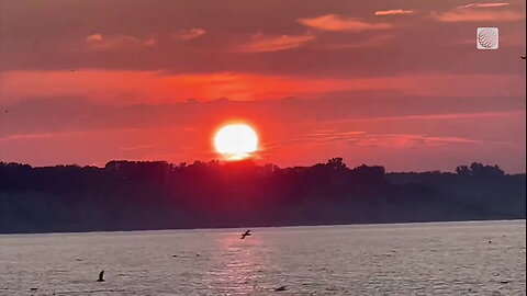 The sunrise burns red above Lake Erie