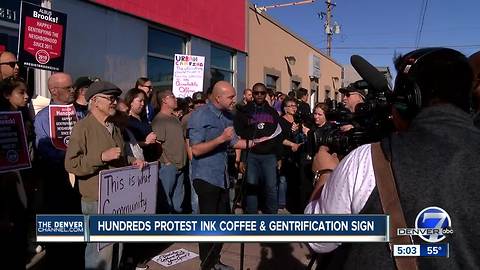 Large crowd demonstrates in front of Denver coffee shop after ad offends community members