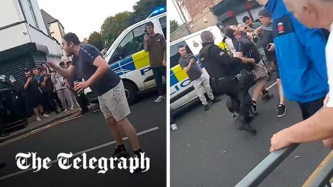 Moment police dog bites rioter shouting 'I pay your wages'| TP