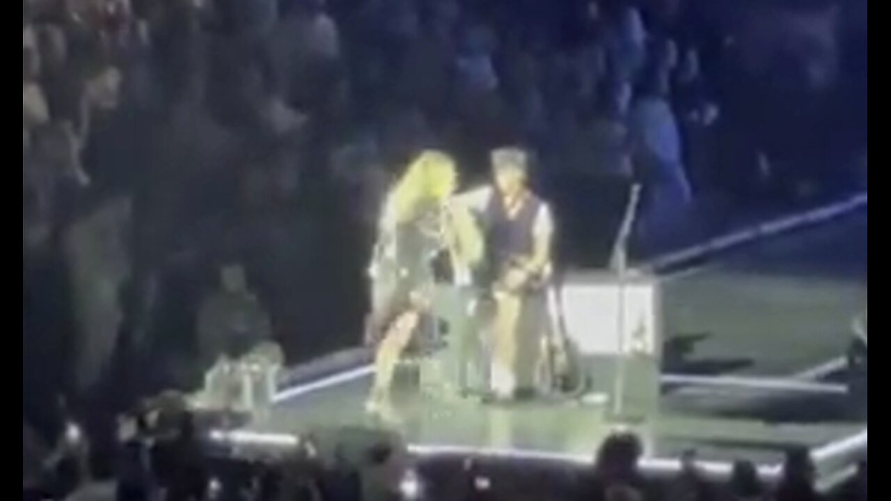 Madonna calls out fan for sitting down during her show then realizes they’re on a wheelchair