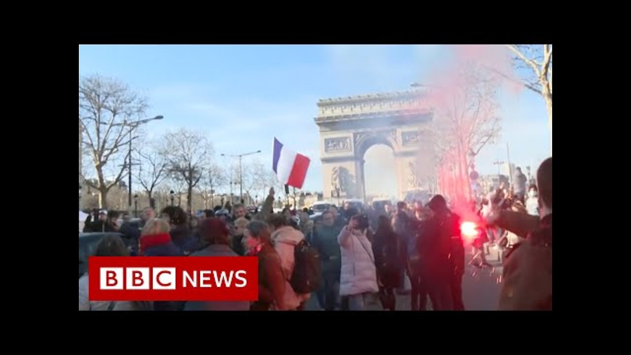 Tens of thousands protest against Covid pass in France - BBC News