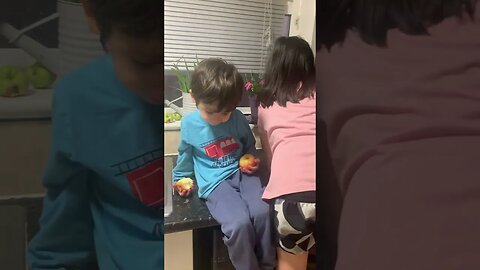 Baby boy is eating apples beside his sister that loves apples too-my sweet kids