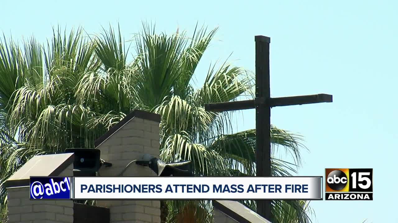 Parishioners attend mass after fire