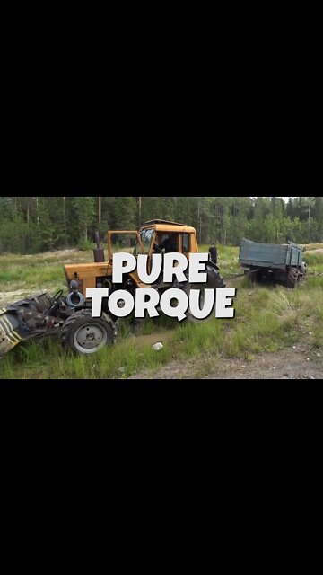 TRACTOR WITH AMAZING TORQUE PULLS HEAVY DUTY TRUCK OUT THE MUD