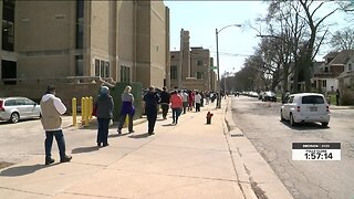 Voters wait in long lines on Milwaukee's north side