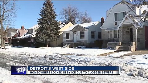Homeowners locked in by ice due to clogged sewers