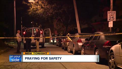 Praying for safety at vigil