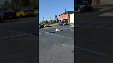 riding my motorcycle and see some corvettes