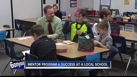 “Guys in Ties” club mentors young students